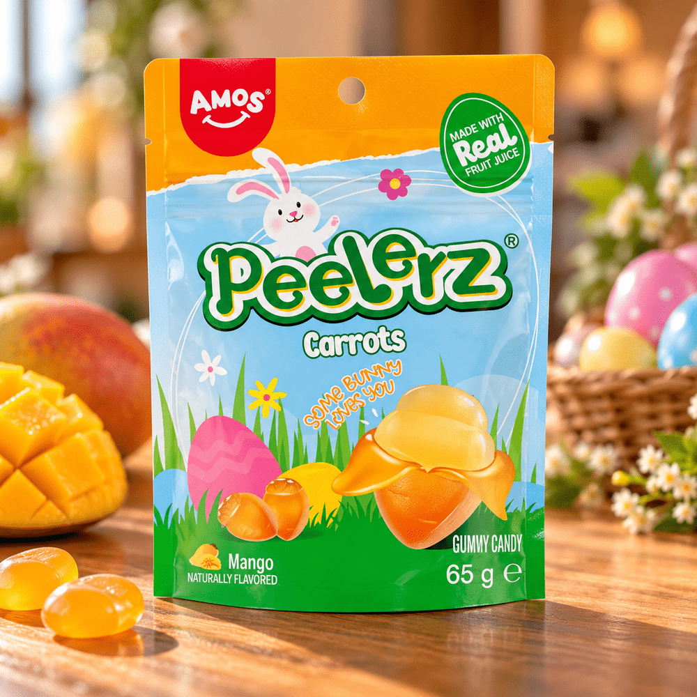 Sachet de bonbons Amos Peelerz Carrots Mango 65 g au goût mangue, accompagné de bonbons orange dans un décor de Pâques.