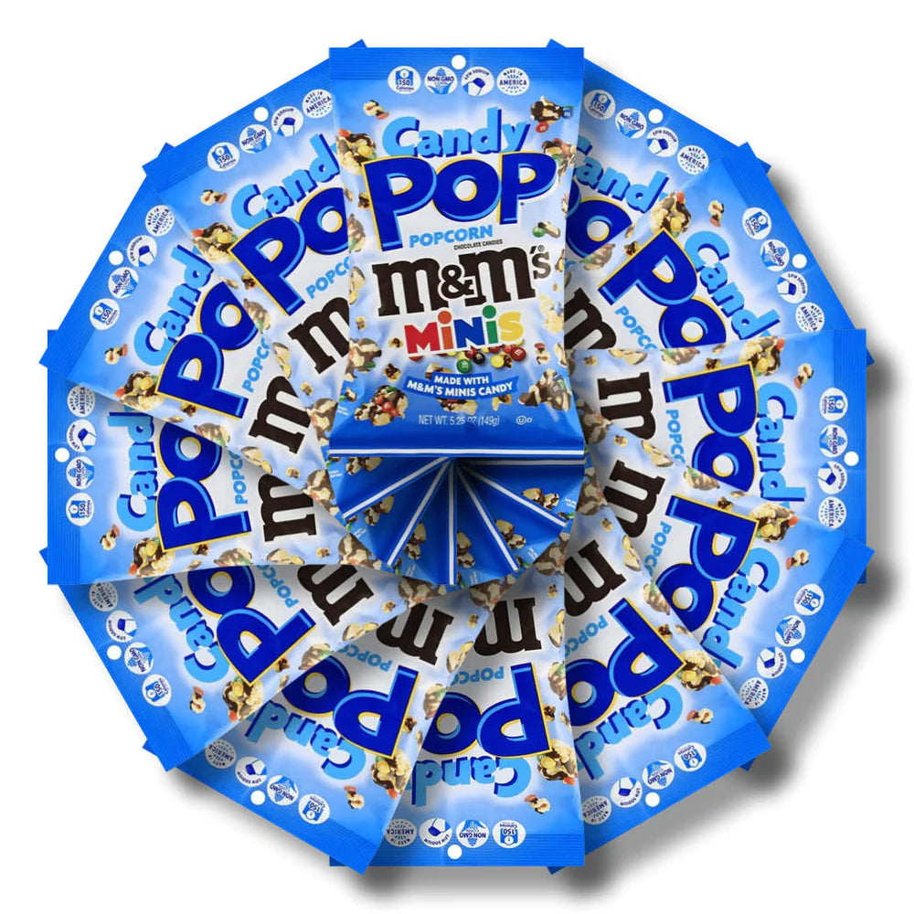 Plusieurs paquets bleus entassées les uns sur les autres sur un fond blanc. Le tout forme une rosace