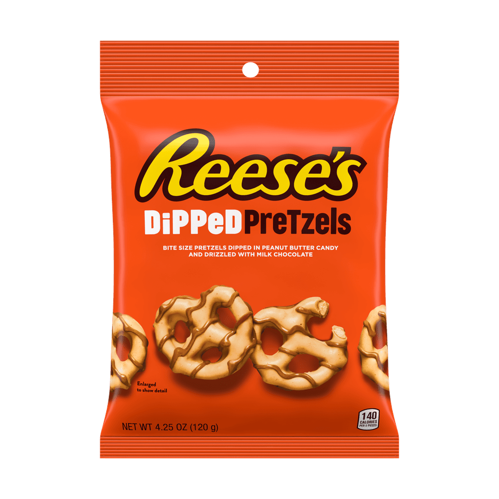 Un emballage orange sur fond blanc, au-dessus il est écrit « Reese’s » en jaune et en-dessous il y a des bretzels avec du chocolat au lait par-dessus