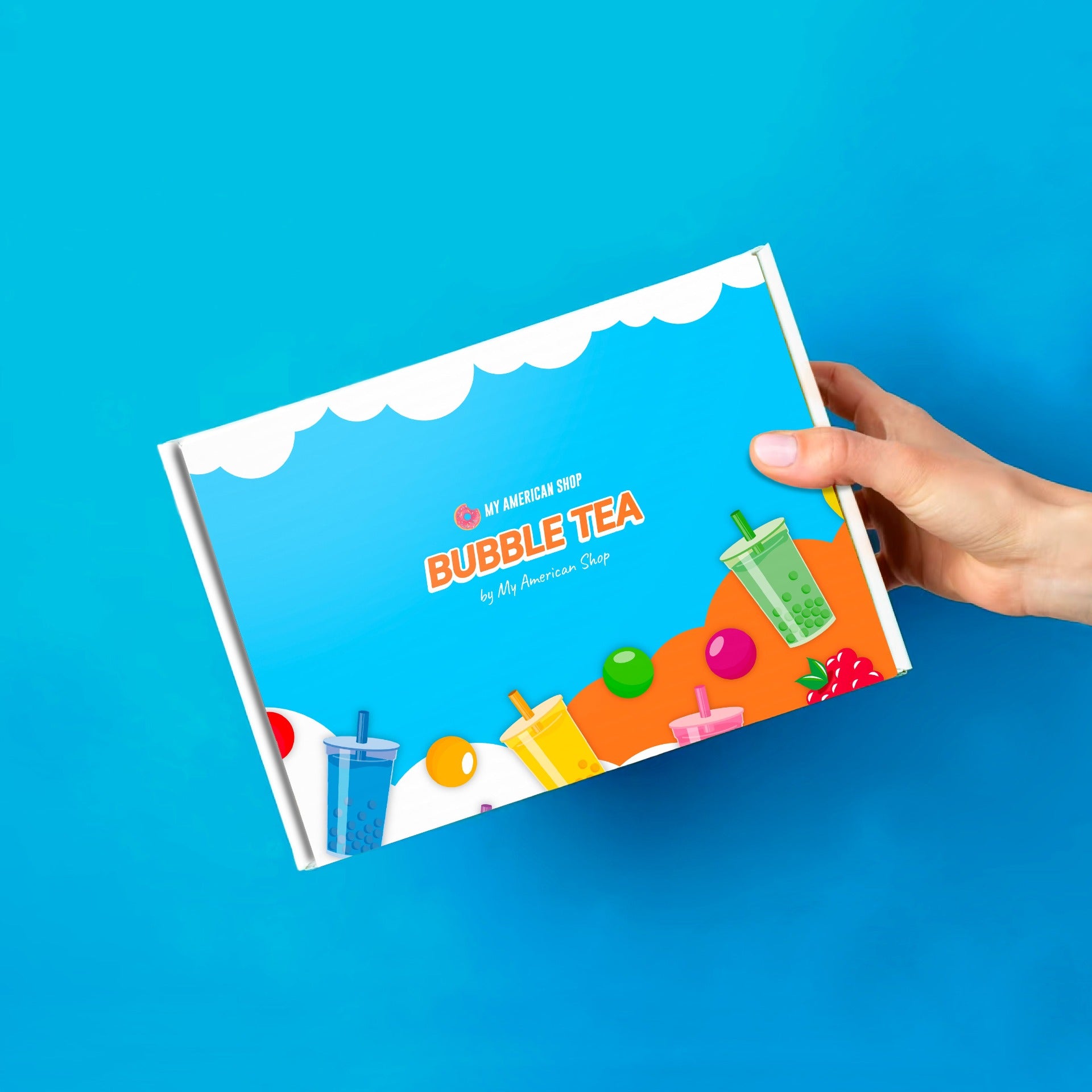 Un carton bleu et orange avec des dessins de perles et des gobelets de bubble tea très colorés, le tout sur fond bleu