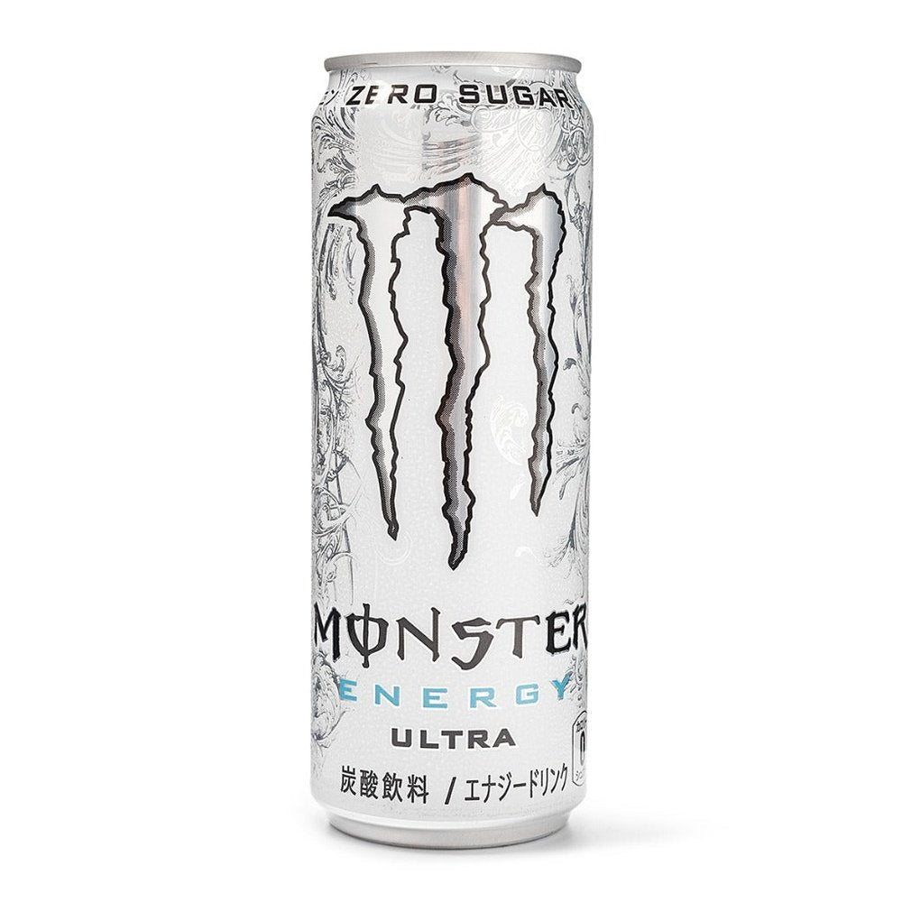 Une grande canette blanche à motifs argentés avec au centre le logo gris argenté de Monster, un grand M. Le tout sur fond blanc